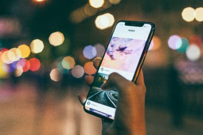 Canva-Bokeh-Photography-of-Person-Holding-Turned-on-Iphone